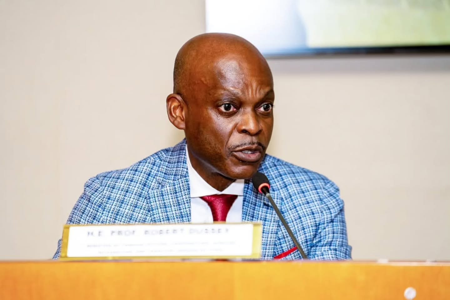 Togo's Foreign Minister Robert Dussey speaking into a microphone during a UN African Group briefing on the Correct the Map draft resolution.