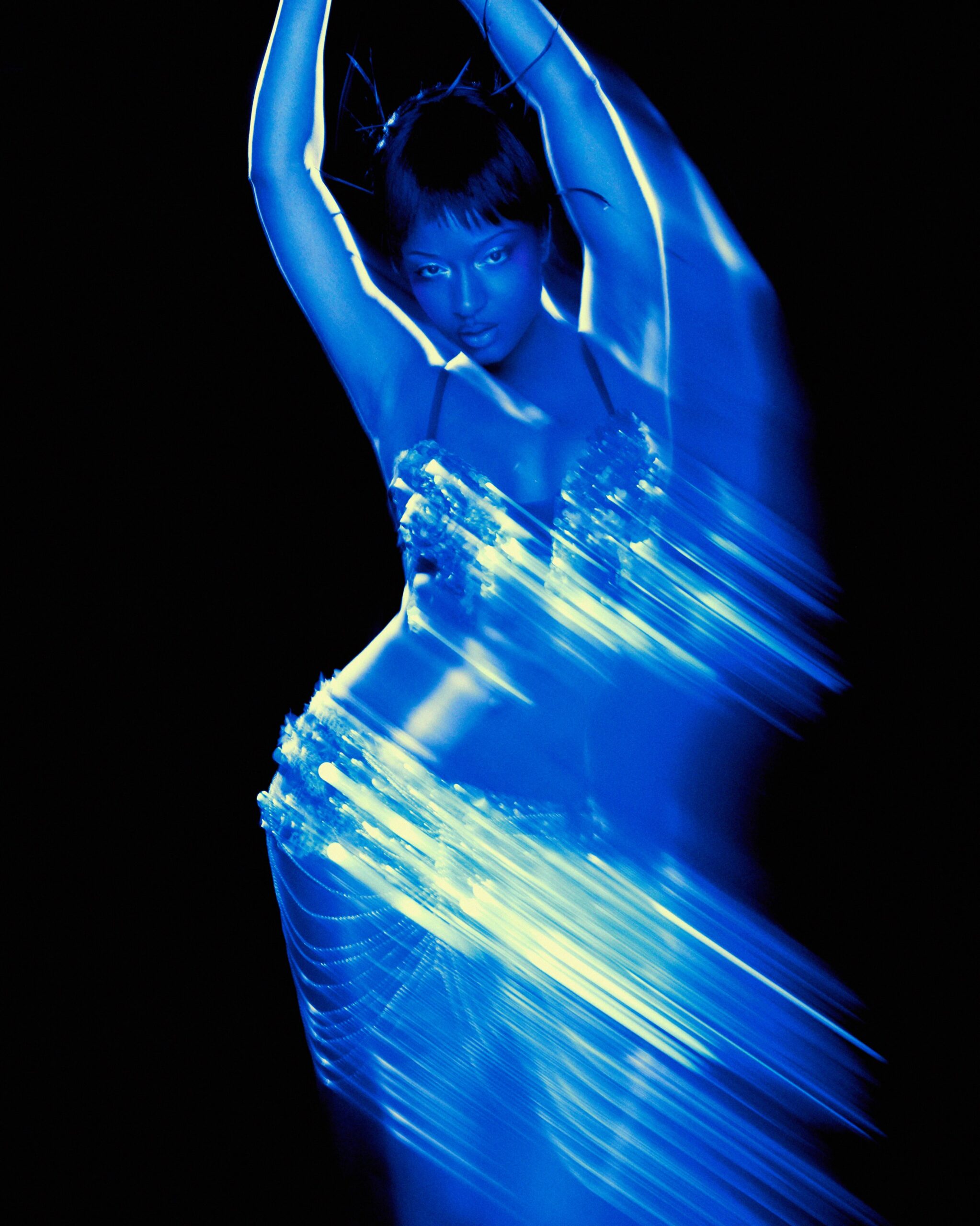 Ayra Starr in Electric Blue Neon Silhouette for 66 GREENE Cover Story