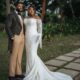 Nollywood actor Stan Nze in P.Aries tailcoat suit with wife Blessing Obasi Nzediegwu in Prudential lace wedding dress at vow renewal ceremony.