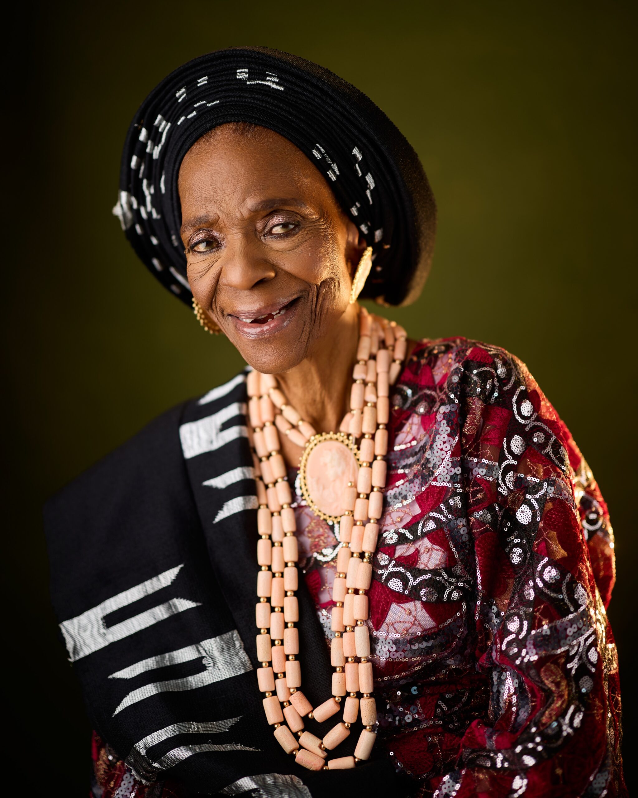 Grace Owoola 96th Birthday Portrait in Sequined Maroon Lace