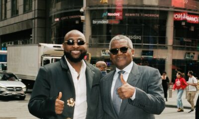 Davido and Aliko Dangote standing on a New York City street during United Nations General Assembly week
