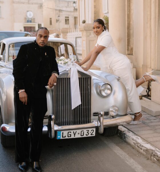 LAX leaning on a vintage silver Rolls Royce while Ella poses on the hood in her wedding dress in Malta.