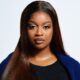 BBNaija Season 11 finalist Temi Nkem looking directly forward in a navy blue outfit