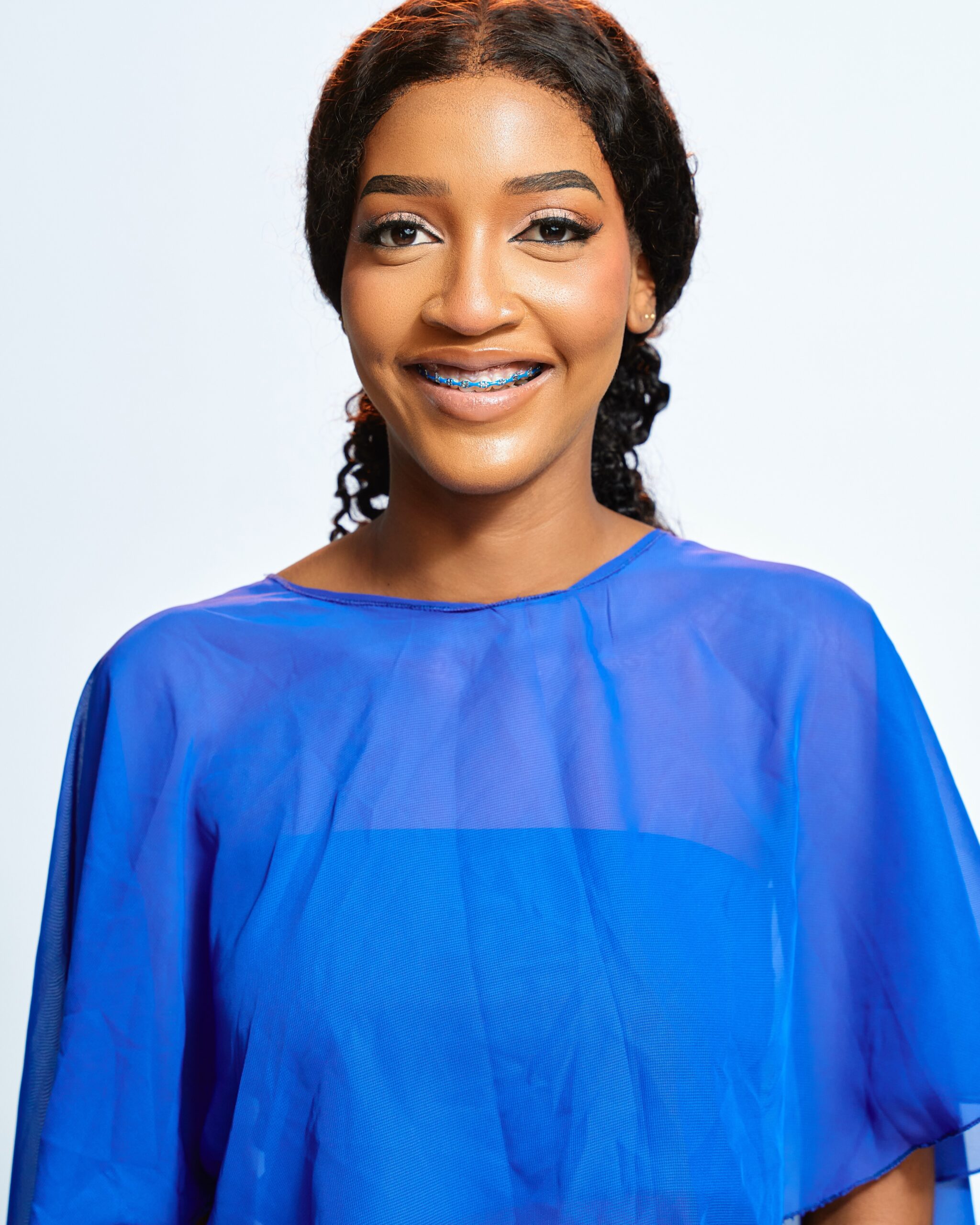 BBNaija Season 11 finalist Bluethopia smiling in a sheer blue top