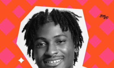 Big Brother Naija Season 11 housemate Keivo smiling in a monochrome photo overlay