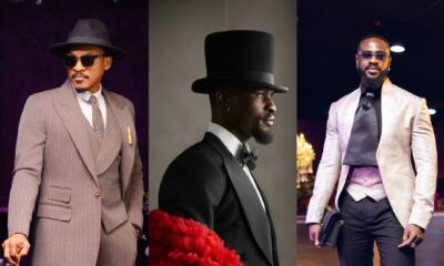 Shawn Faqua in a pinstripe suit, Larry Hector in a tailcoat with red boa, and Yemi Cregx in a blush jacquard jacket at BellaNaija red carpet.