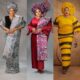 Toyin Abraham Ajeyemi wearing silver and black aso-oke, crimson velvet with damask, and mustard yellow fringe outfits.