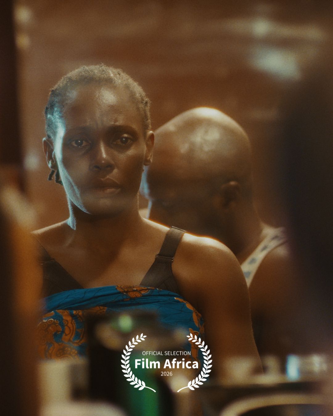 Ejovwoke Obas Olikuntuyi as Ejiro looking ahead with a pensive expression in Her Daughters Mother featuring Film Africa 2026 laurel