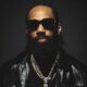 Nigerian rapper and singer Phyno wearing dark sunglasses, a leather jacket, and a diamond cross pendant, promoting his romantic highlife single Beautiful featuring a spoken intro by Nancy Isime from his album Let That Sink In (LTSI).