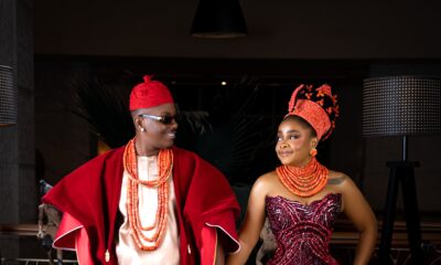 Timini Egbuson and Bimbo Ademoye smiling at each other in traditional Nigerian bridal wear