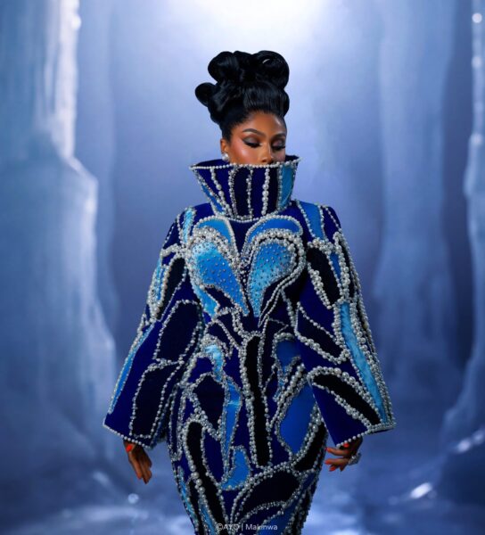 Mercy Eke’s High Fashion Icon Look Pairs Ice Blue Velvet With Cobalt and Pearls
