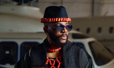 Ebuka Obi-Uchendu wearing a webbed coral bead torso piece under a black hand-woven Atafo coat for BBNaija Season 11 grand finale.