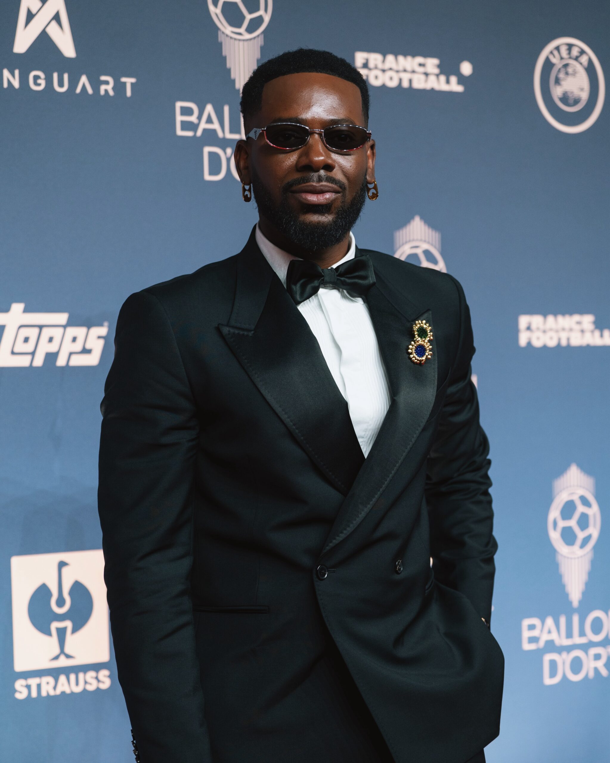 Adekunle Gold Brings Black-Tie Style & Afrobeats to the Ballon d’Or