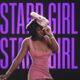 Ayra Starr wearing a pink mini dress and matching side cap against purple Starrgirl typography in the Ms Paper music video.